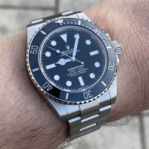 rolex submariner gold blue wrist|rolex submariner 124060 thickness.